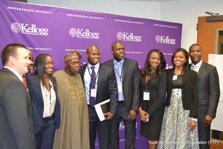 Njideka Harry (pictured 2nd from right) with a cross-section of Kellogg leadership team for the Africa Business Conference and Former President Obasanjo of Nigeria. 